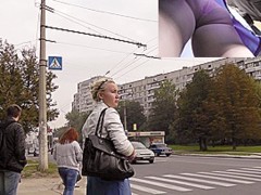 Lilac panties revealed in a street upskirt voyeur hunt