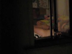 Window voyeur porn with the nasty amateur couple