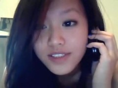 Asian american girl has phonesex with her bf and shows herself naked on cam