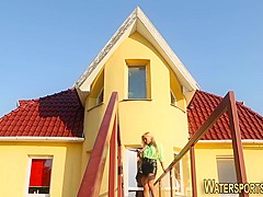 Clothed babe piss soaked