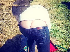 candid buttcrack shows in black jeans
