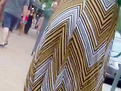 Sexy babe walks by a construction yard