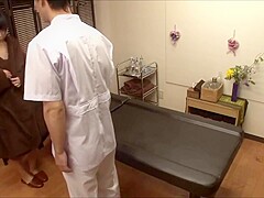 The young wife was tempted by the masseur's big cock, fucked nearby husband